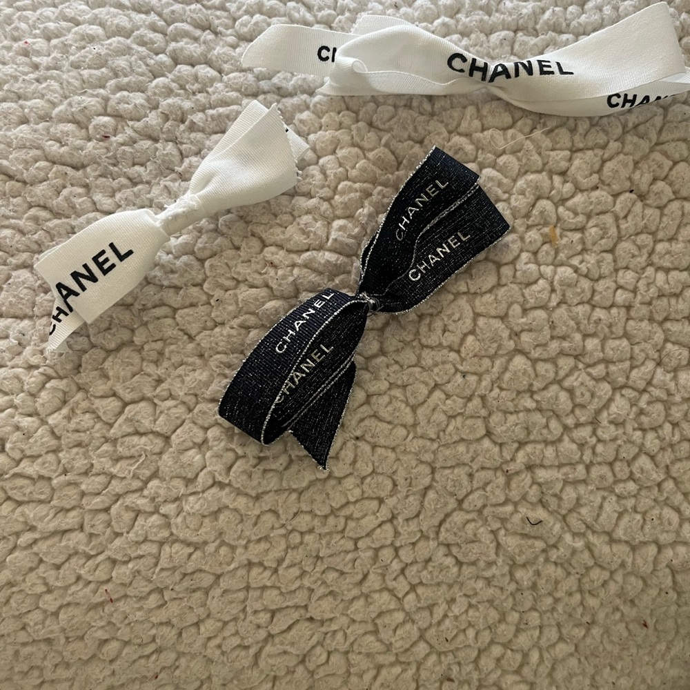 Designer ribbon from Chanel wrap:2-black & white, 1- metallic blue hair tie